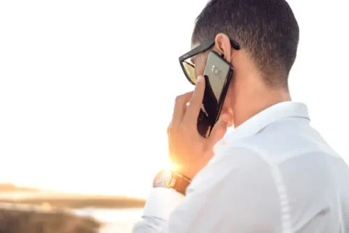 A man talking on the phone.