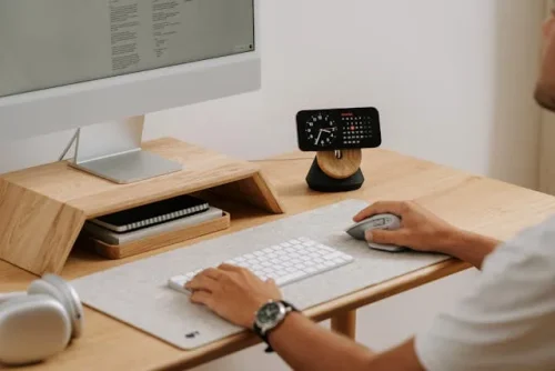 A man working at the home office desk